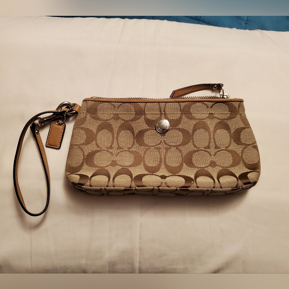 Coach signature collection wristlet. Perfect for prom/dance.